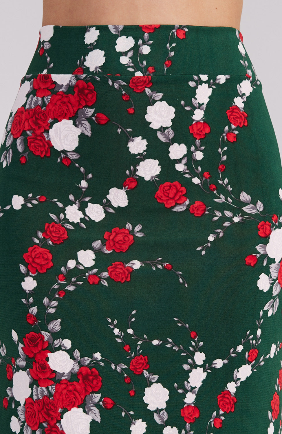 red rose print on green